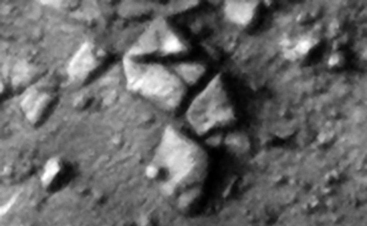 Weird blocks that have moved apart, a small feature or knob can be seen on the bottom block