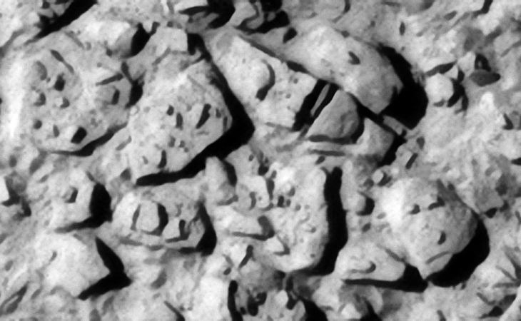 Mechanical wreckage and/or megaliths? Note the well defined edges of these metal plate type objects and the smaller parts or features on top of them