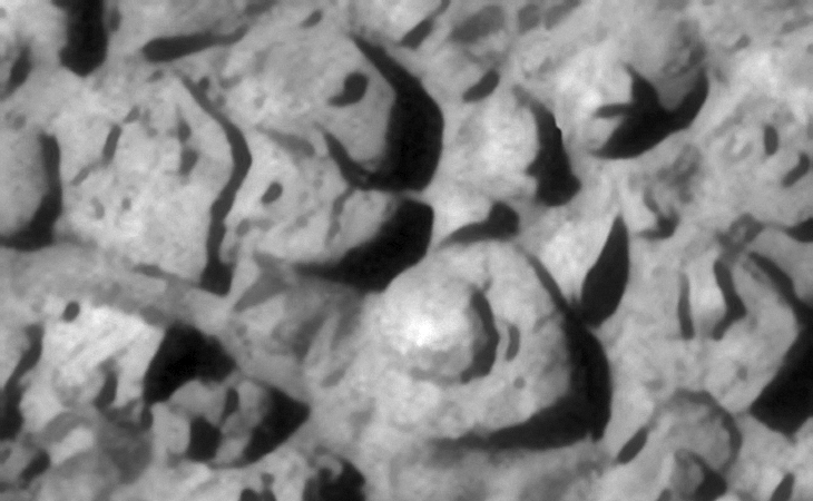 Large dome on top of larger disc shaped object located to the bottom right. Could this be a craft of some type?