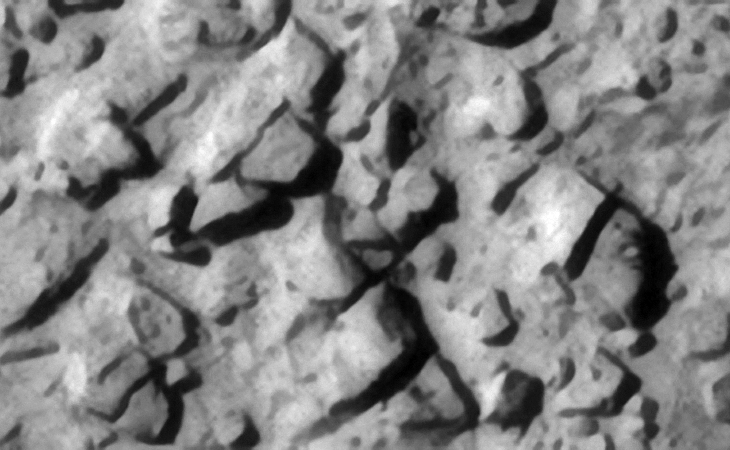 Multiple interlocking/layered objects. Some appear metallic in nature while others megalithic in nature
