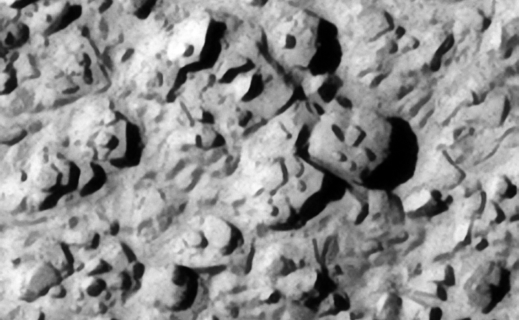 Mechanical wreckage and/or megaliths? Note the well defined edges of these metal plate type objects and the smaller parts or features on top of them