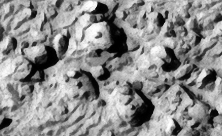 Mechanical wreckage and/or megaliths? Note the well defined edges of these metal plate type objects and the smaller parts or features on top of them