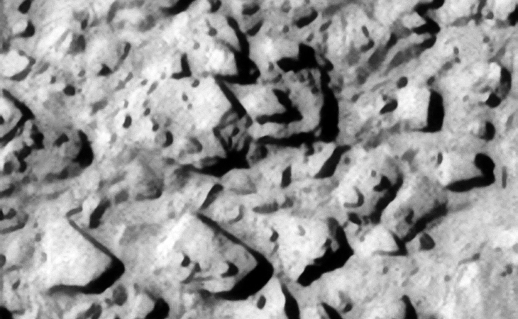 Mechanical wreckage and/or megaliths? Note the well defined edges of these metal plate type objects and the smaller parts or features on top of them