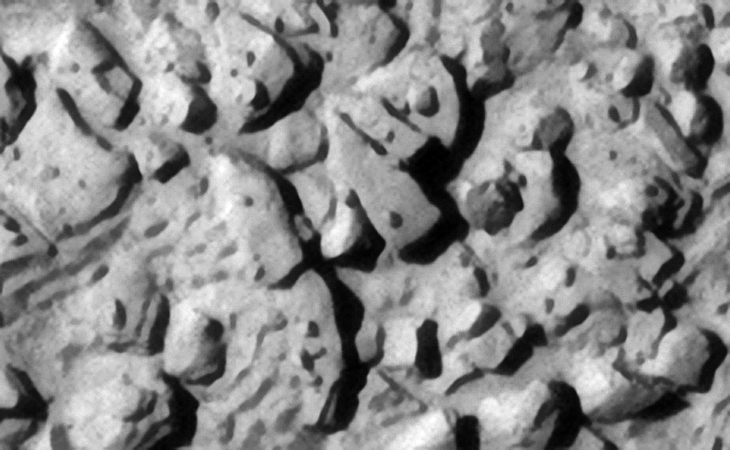Mechanical wreckage and/or megaliths? Note the well defined edges of these metal plate type objects and the smaller parts or features on top of them