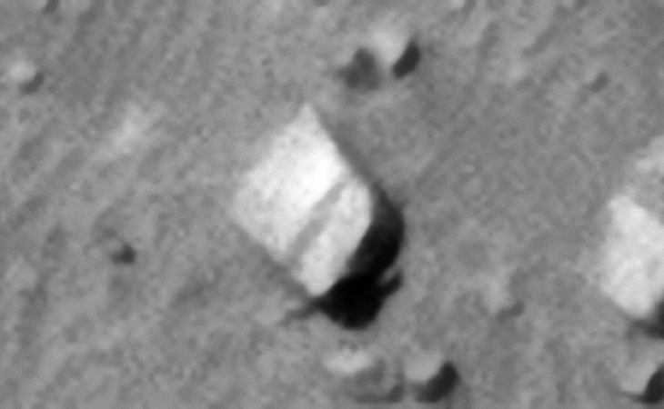 Rectangular megalith is rounded corner and stepped surface