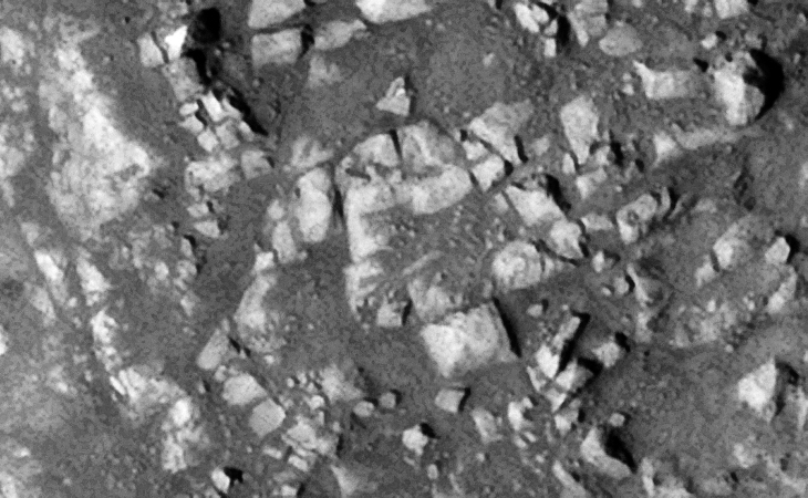 Toppled walls and structure foundation, flat faces, right angles and almost perfect geometry