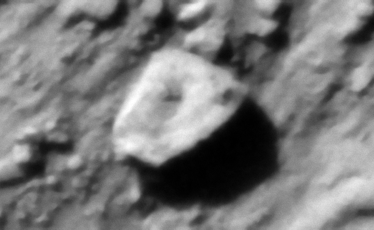 Megalithic block with knobs or smaller features on top