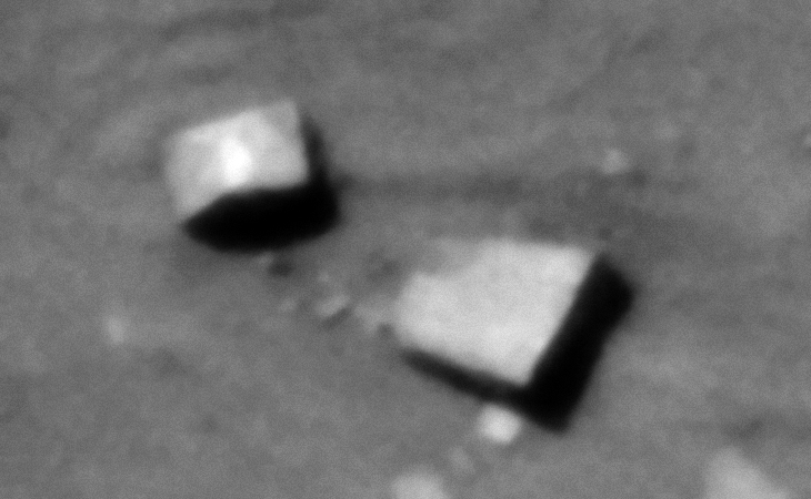 Megalithic blocks/slabs or some type of metallic-looking plates or technology