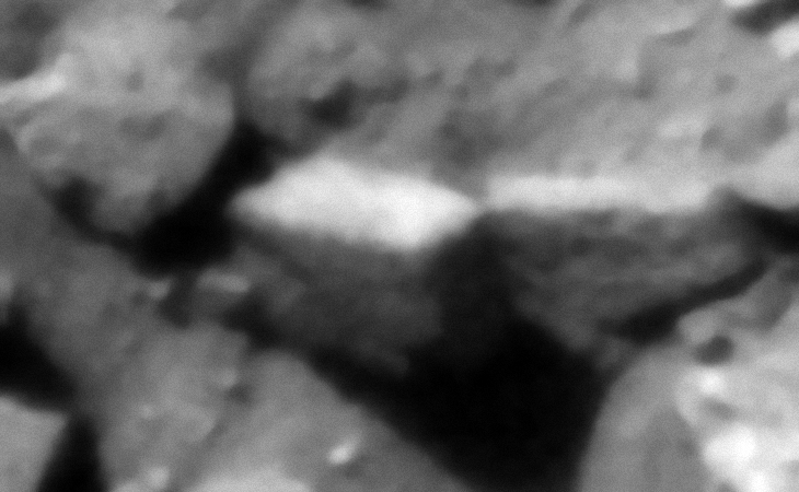 Exposed, inter-locking megalithic blocks