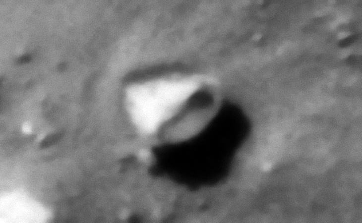 Metallic-looking technology, perhaps some type of wrecked craft