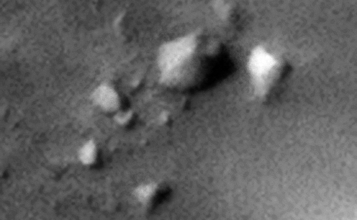 Strange Symmetrically-Shaped Debris or Boulders?