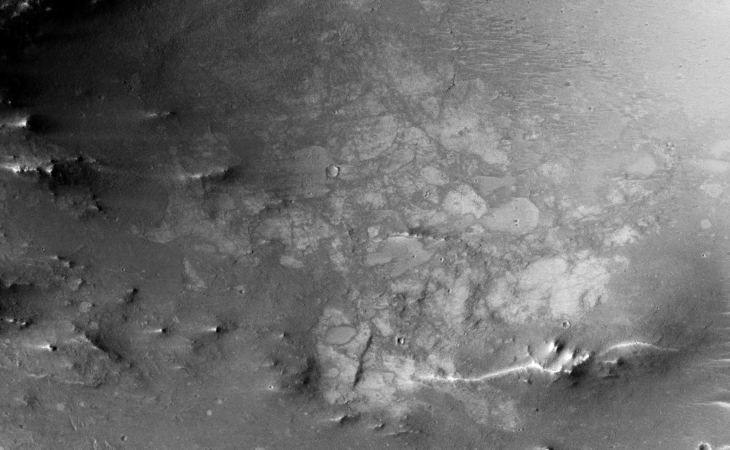 Strange surface features, perhaps some remnants of a city with circular dams?