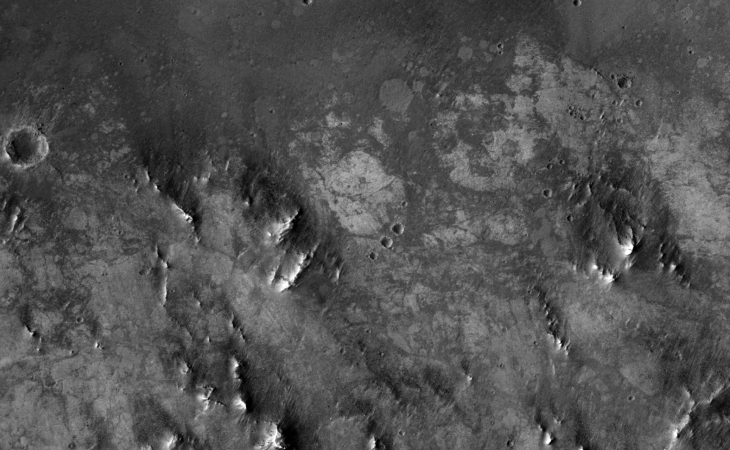 Strange surface features, perhaps some remnants of a city with circular dams?