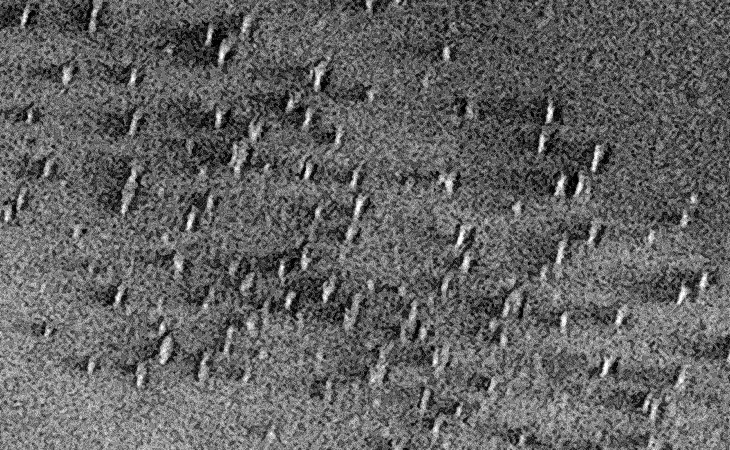 Underground base ventilation system? Black area's traces being revealed next to the openings?