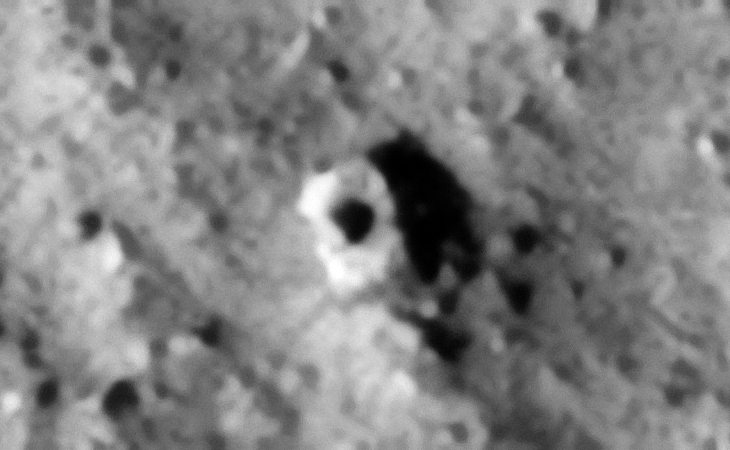 Megalith or metallic object? Another dome-like feature or knob is seen in the center