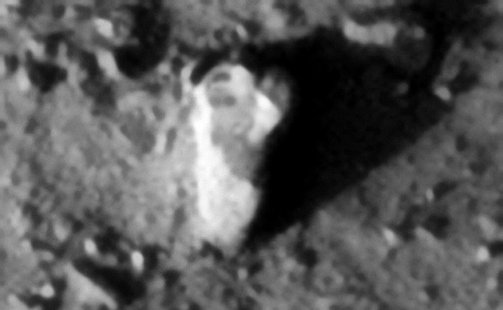 Part of a sculpture or statue or wreckage?