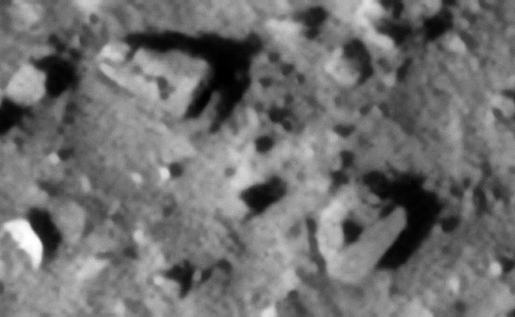 Top left: A pillar? Bottom right: Metallic plate or megalithic slab with smaller pyramidal feature or knob and strange square feature on top