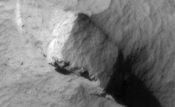 Huge megalithic block lying on the side of a hill