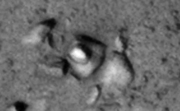 'Skirt-type base' and smaller oblong dome object on top