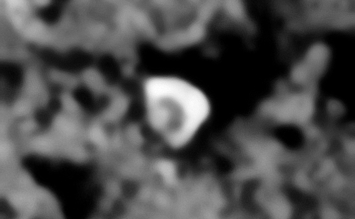 Disc-like object with dome on top