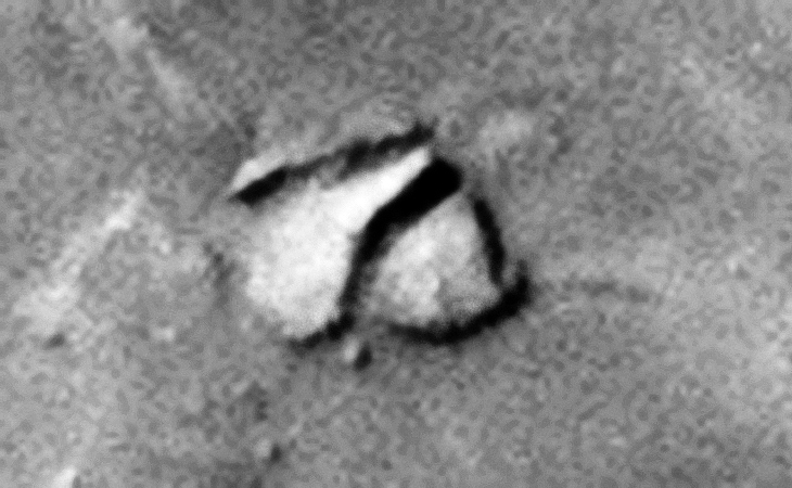 Structure broken into three flat pieces