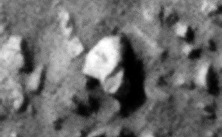 Hexagonal shaped object with one side bent underneath