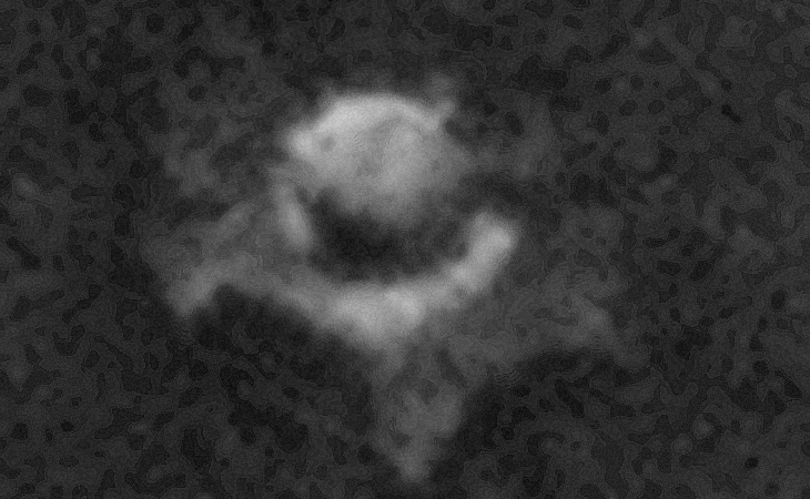 Circular walled structure with megalith/cylindrical craft to the left and opening to the right?