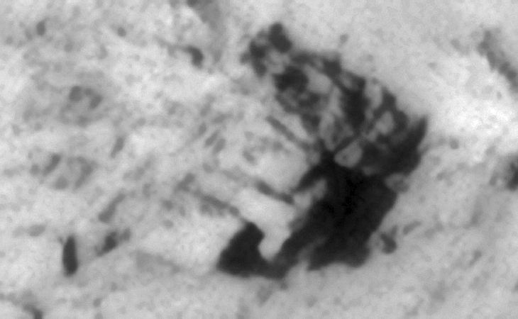 Shelter, underground entrance-way ot destroyed machinery?