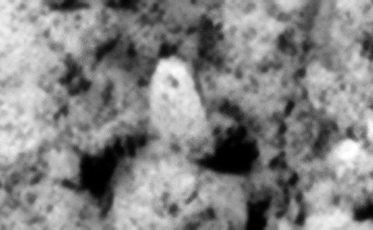 Monolith with symbol located to the top centre