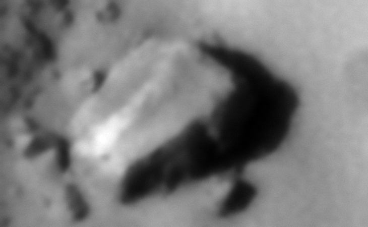 Megalithic-type block with flat sides and straight edges, check out the long narrow line running over the top