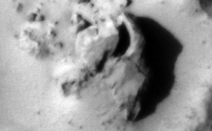 Some kind of structure with a long narrow rectangular opening or slot