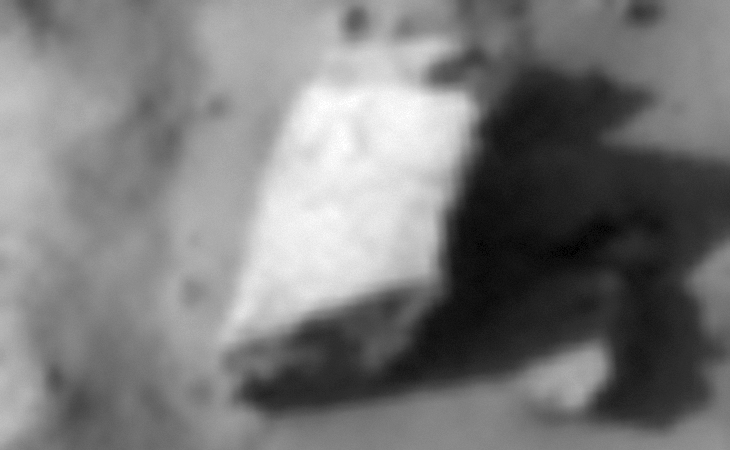 This rectangular object looks like part of a wing, check out the aerofoil shape