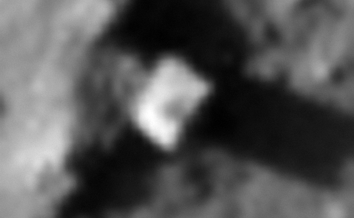 A square-shaped object sticking out of the surface