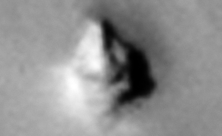 Two rectangular objects stacked on top of each other with a long narrow piece on top