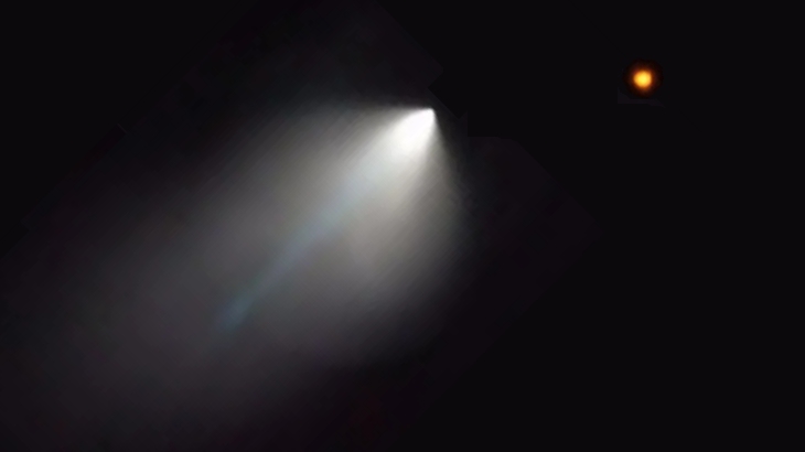 'Enormous white light' and a 'red ball'